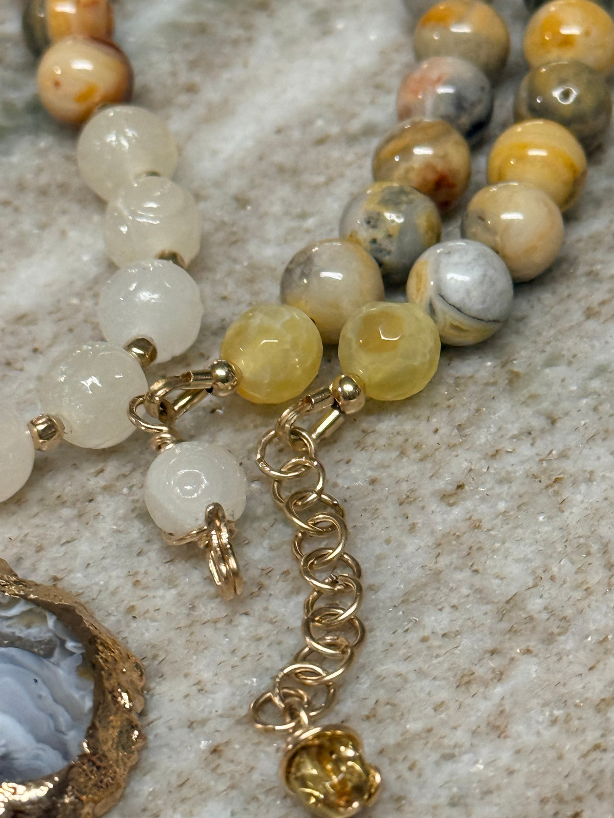 Gold-Rimmed Agate
Geode Pendant & Crazy Lace Statement
Necklace