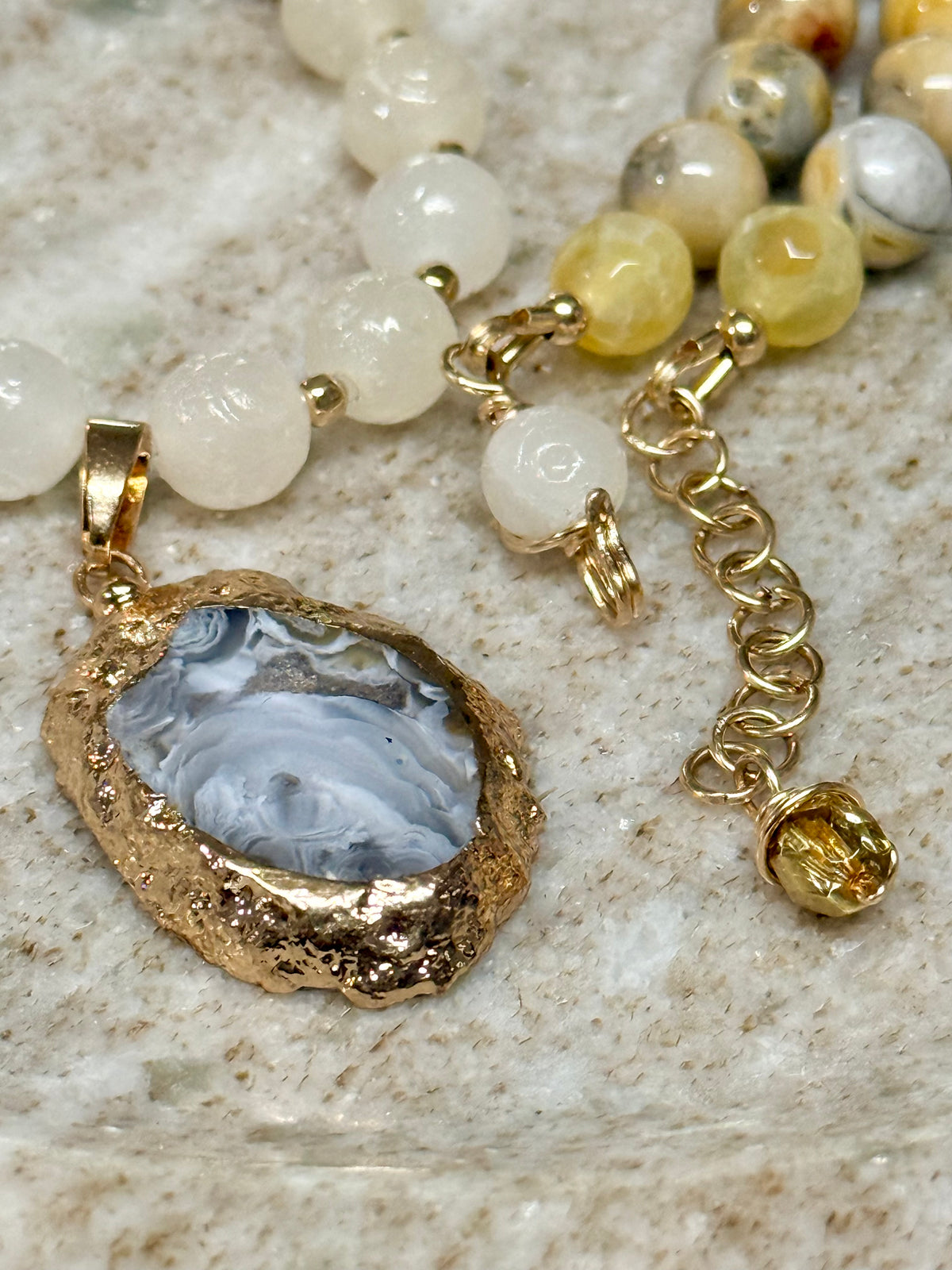 Gold-Rimmed Agate
Geode Pendant & Crazy Lace Statement
Necklace