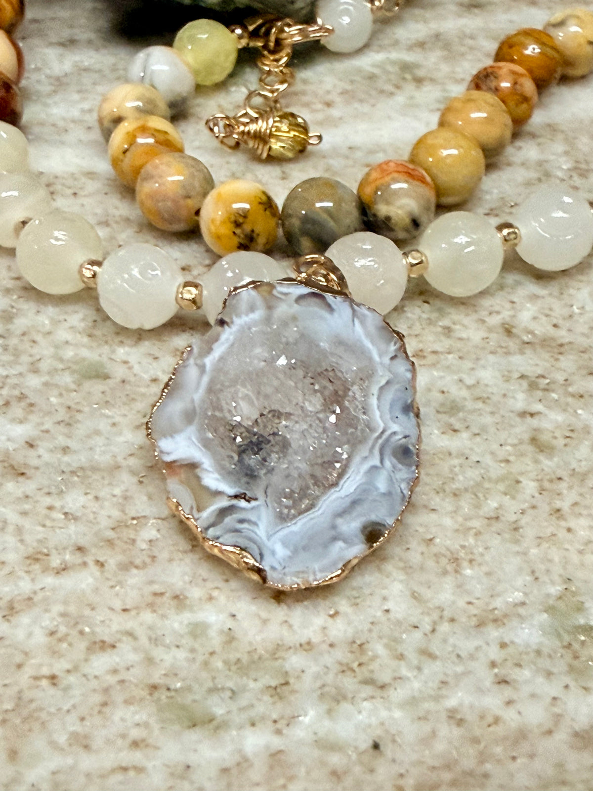 Gold-Rimmed Agate
Geode Pendant & Crazy Lace Statement
Necklace